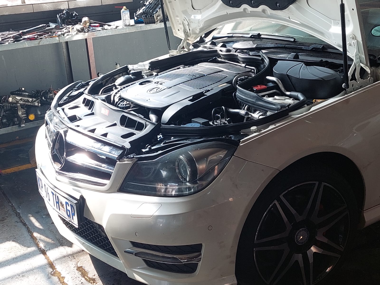 Mercedes-Benz engine bay opened up for servicing